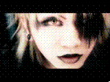 Kyu from Dir en Grey licks his lips