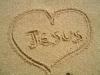 jesus' name in the sand